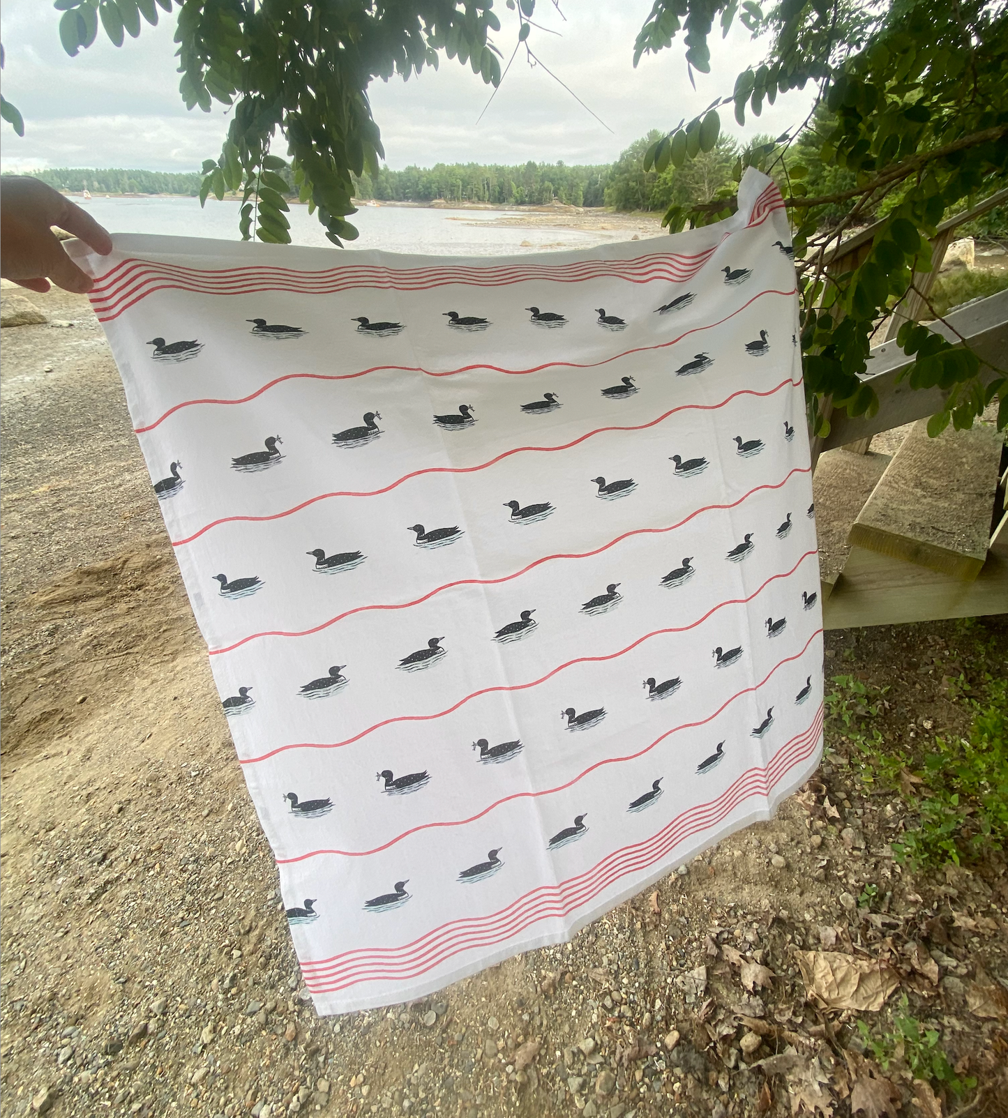 Independent Puppy - Swimming Loons with Red Waves Tea Towel | 27 x 27"