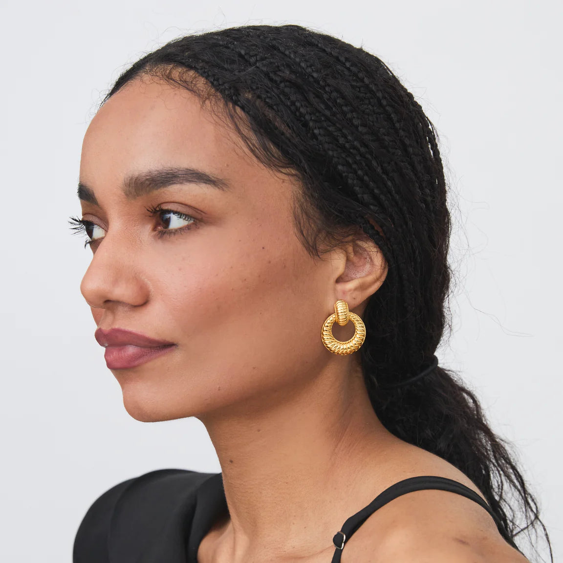 della earrings gold